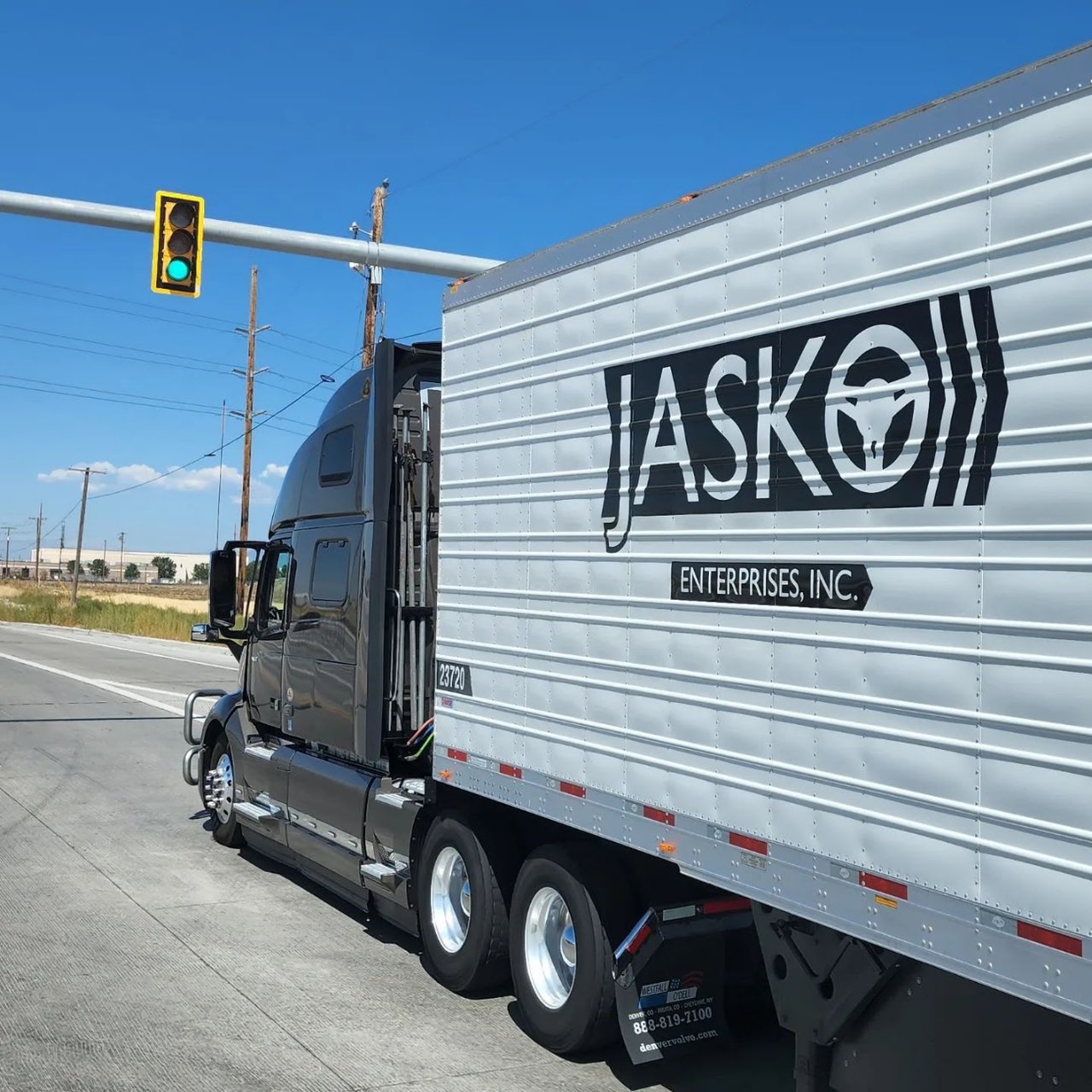 JASKO refrigerated trailer and tractor on the road